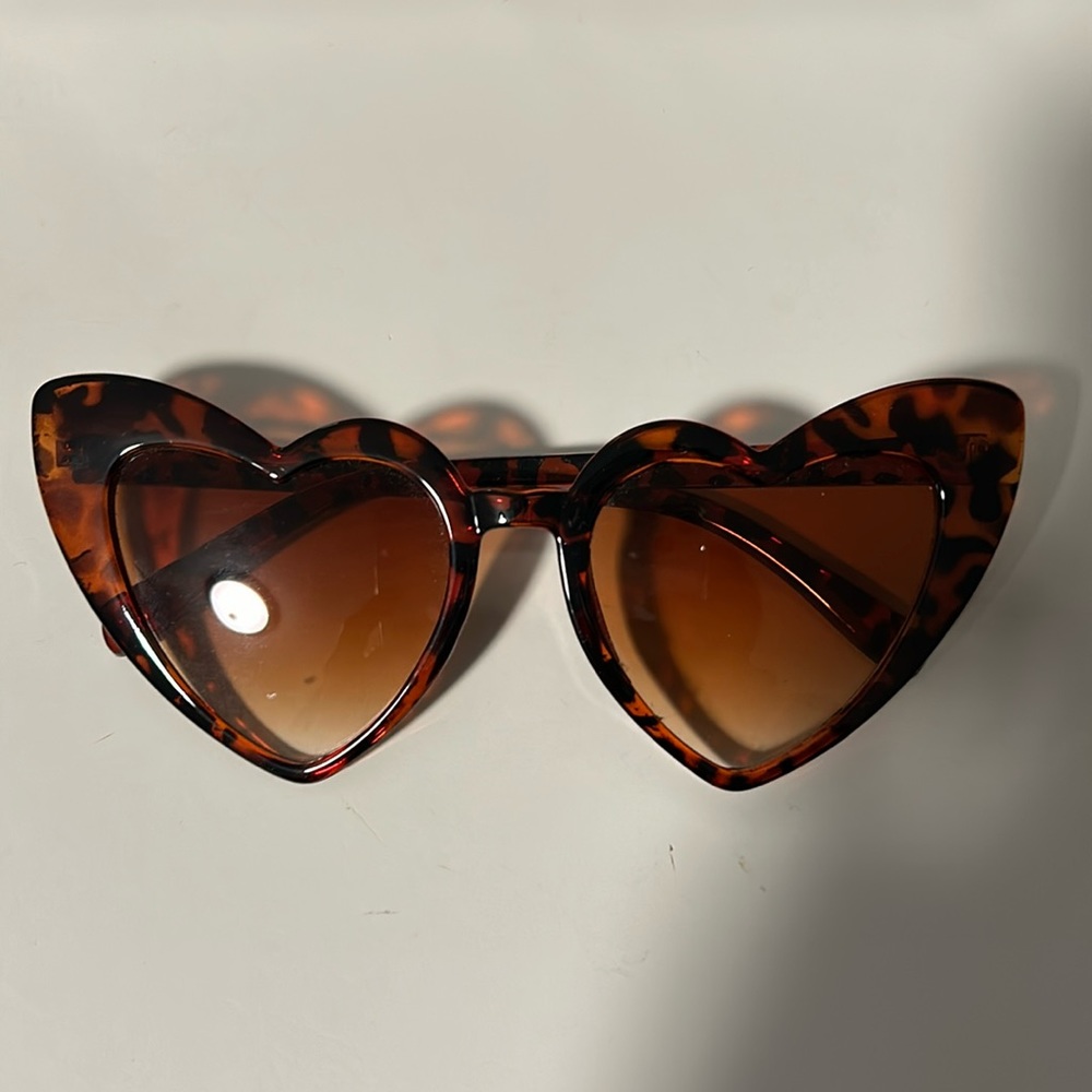 Adorable tortoise-shell heart-shaped sunglasses. Wore for a bachelorette